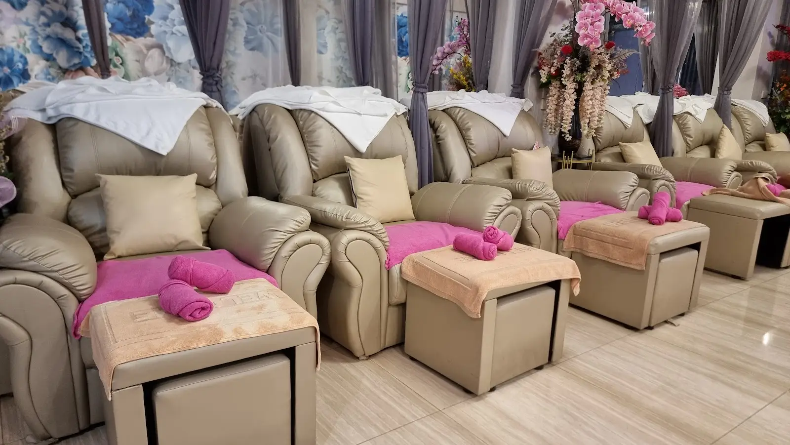 Foot massage chairs with pink towels